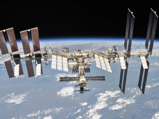 The International Space Station (ISS) with Earth in the background.