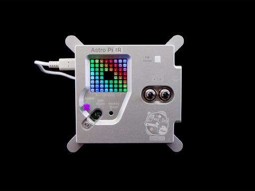 The top of the Astro Pi IR in its flight case, showing the matrix screen, joystick, and buttons.
