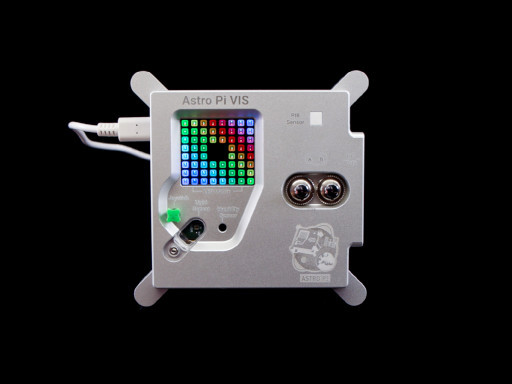 The top of the Astro Pi VIS in its flight case, showing the matrix screen, joystick, and buttons.