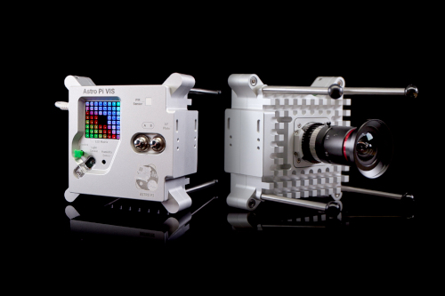 A picture of the Astro Pi computer with camera and Sense Hat light display