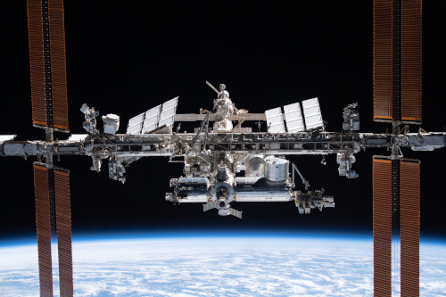 A picture of the ISS in orbit above Earth